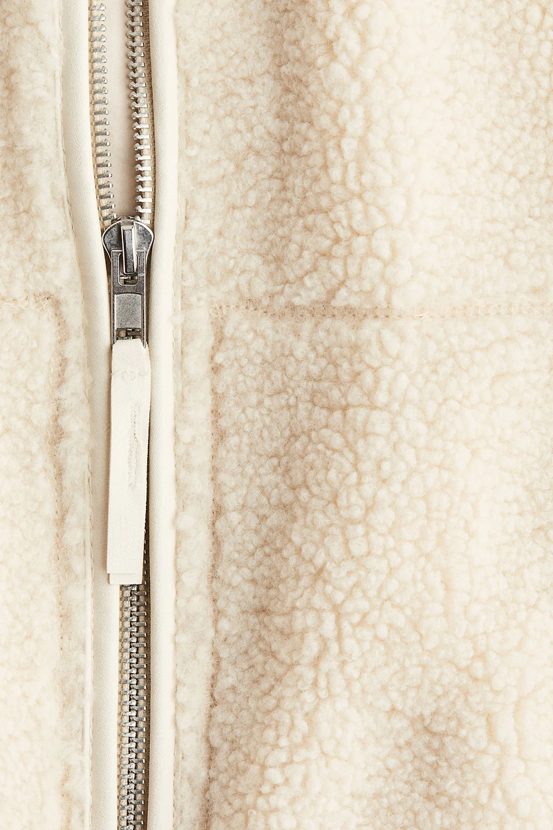 Veste flottante en tissu peluche