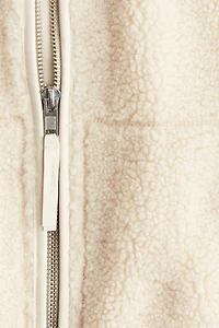 Veste flottante en tissu peluche