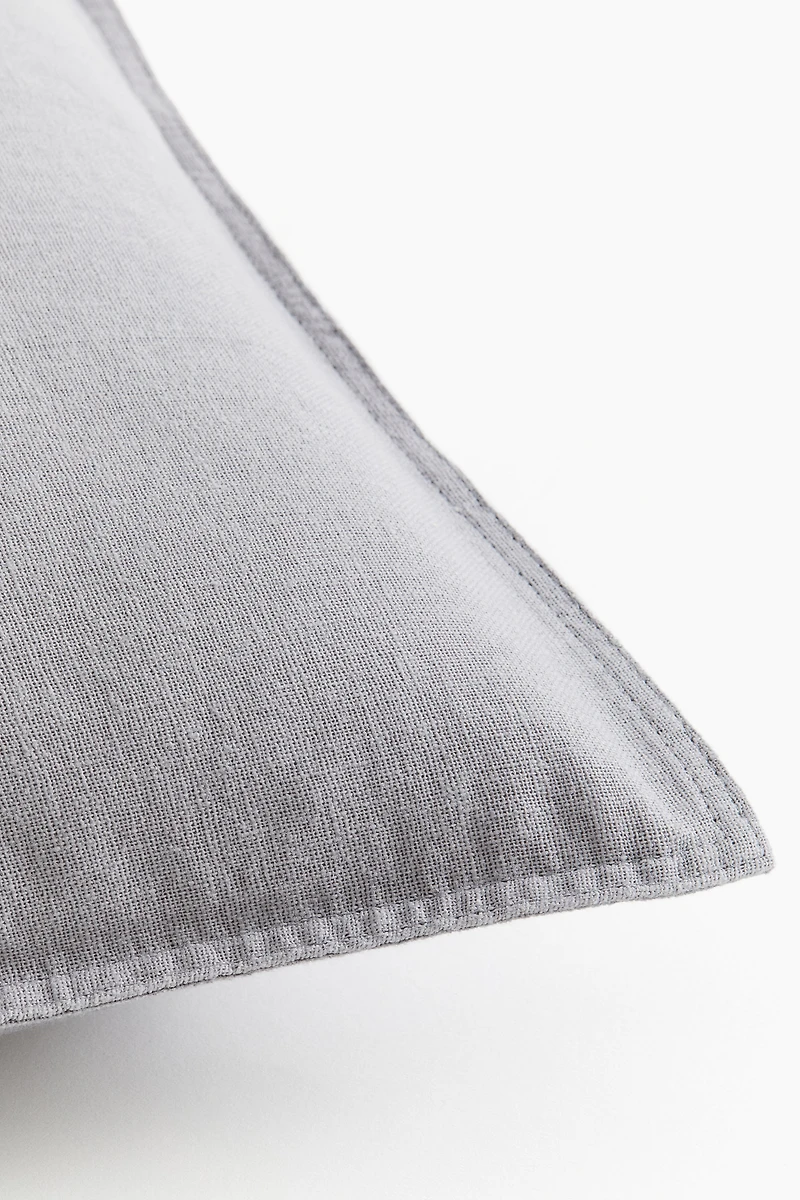 Housse de coussin en lin mélangé