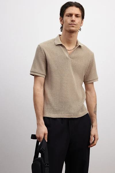 Polo classique en tricot ajouré
