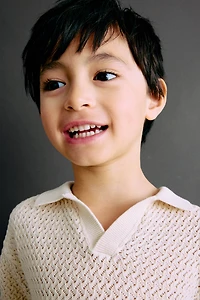 Polo en tricot texturé