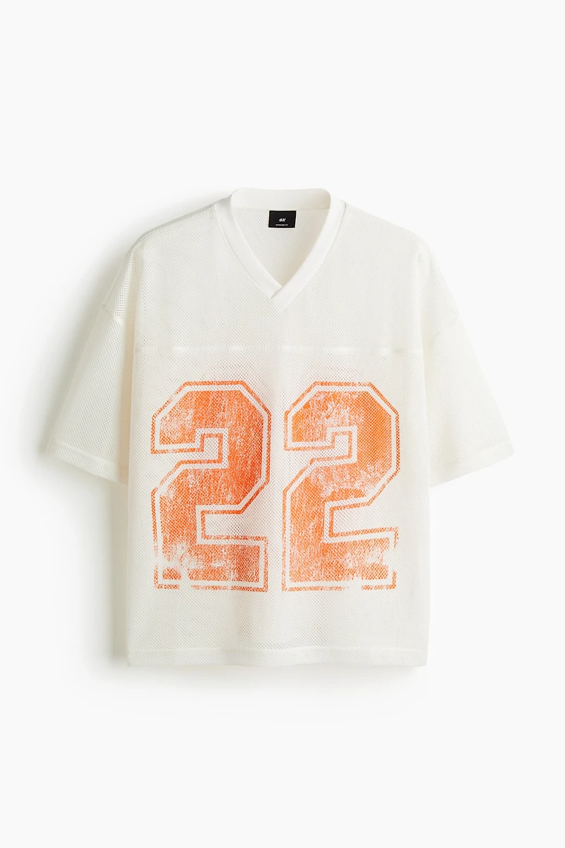 T-shirt très grand en filet imprimé