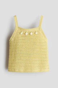 Haut ornementé en tricot