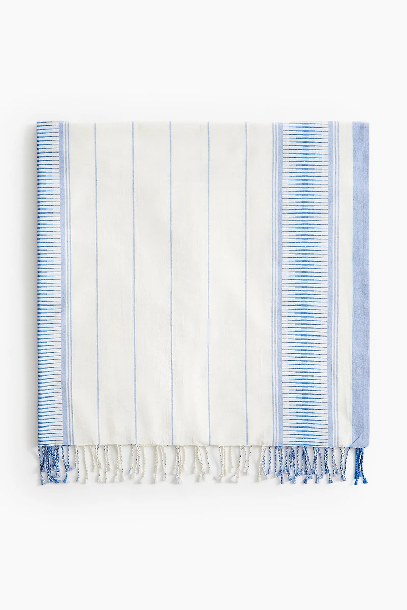 Serviette de plage en tissu jacquard