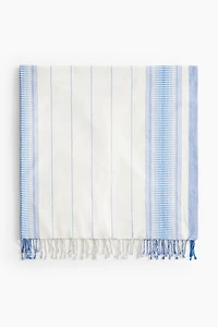 Serviette de plage en tissu jacquard