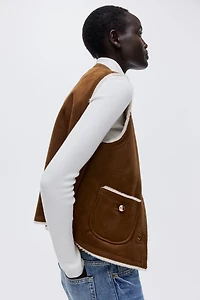 Veste sans manches doublée de tissu peluche