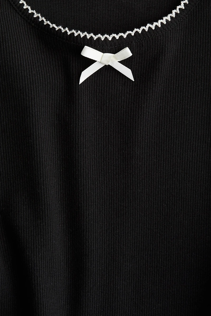 Haut en jersey à bords picots