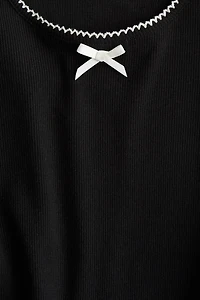 Haut en jersey à bords picots