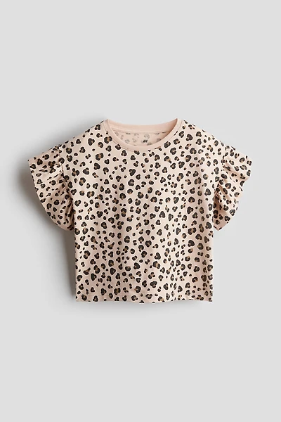 Haut à manches volants