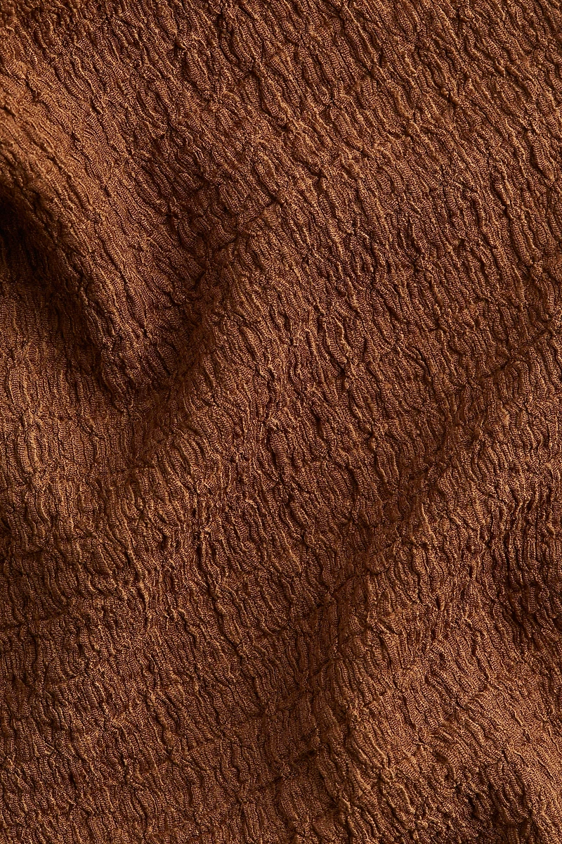 Pantalon évasé à effet froissé