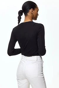 Flared ankle-length trousers