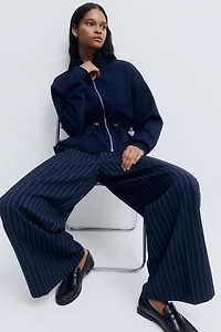 Chandail péplum à fermeture éclair