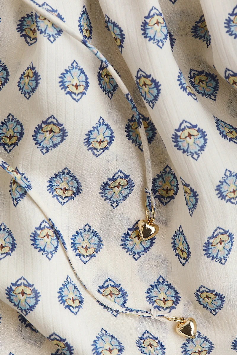 Smocked Dress with Flared Skirt