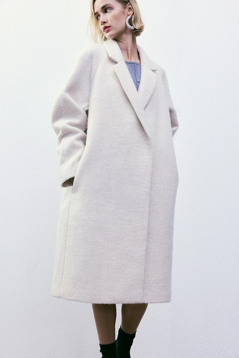 Manteau à fermeture croisée