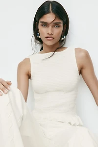 Haut nid d'abeille à encolure bateau