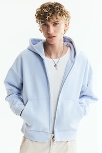Veste imprimée ample à capuche et fermeture éclair