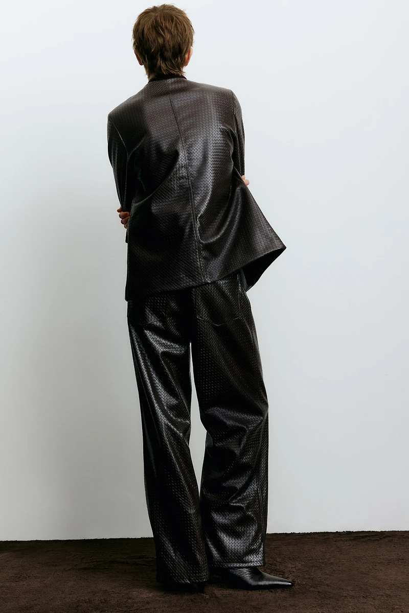 Pantalon en tissu enduit