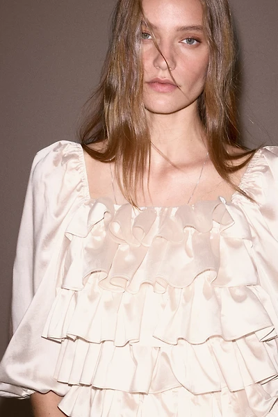 Blouse à volants plissés manches bouffantes