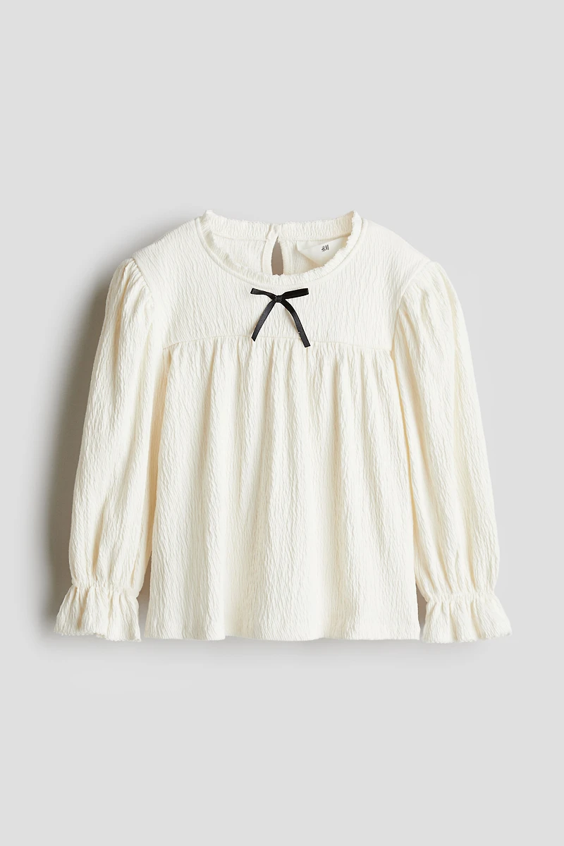 Blouse à bords picots