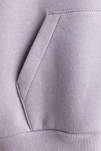 Veste grande taille à capuchon et fermeture éclair