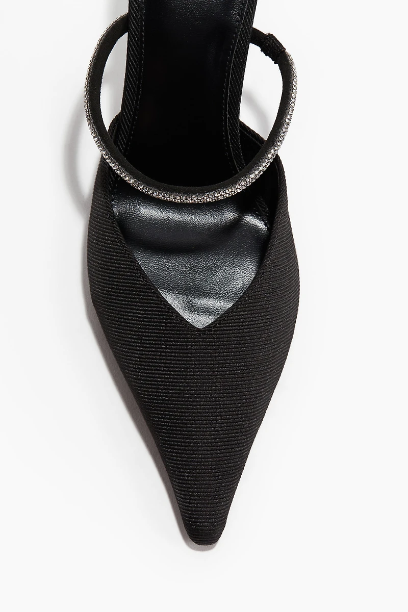 Mules à talon ornementées