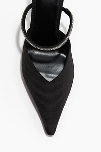 Mules à talon ornementées