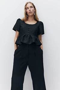 Blouse péplum en brocart