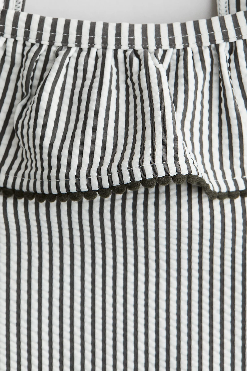Maillot de bain volanté avec épaules dénudées