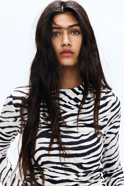 Haut à effet drapé