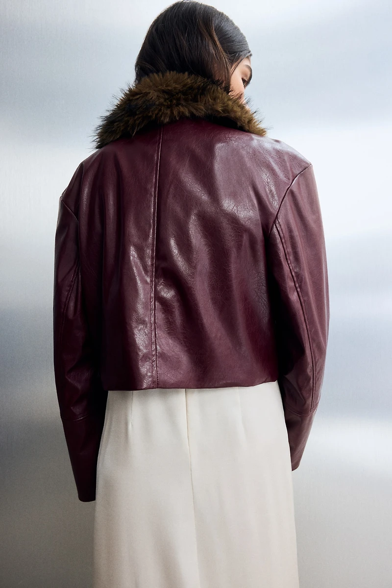 Veste courte en tissu enduit