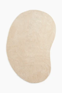 Grand tapis asymétrique