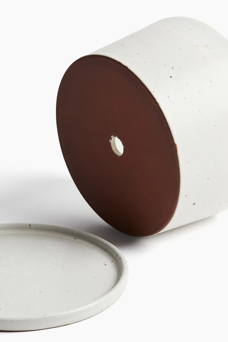 Wide terracotta plant pot and saucer