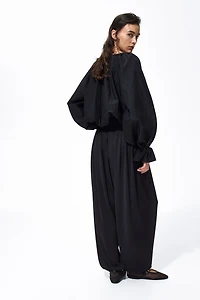 Pantalon plissé à jambes tonneau