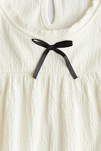 Blouse à bords picots