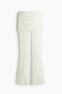 Pantalon en dentelle avec jupe superposée