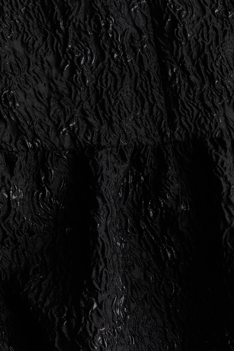 Robe en tissu jacquard à effet boule