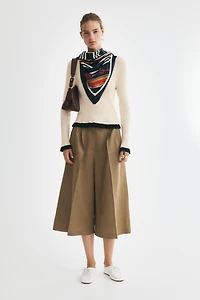 Ruffle-Trimmed Rib-Knit Top