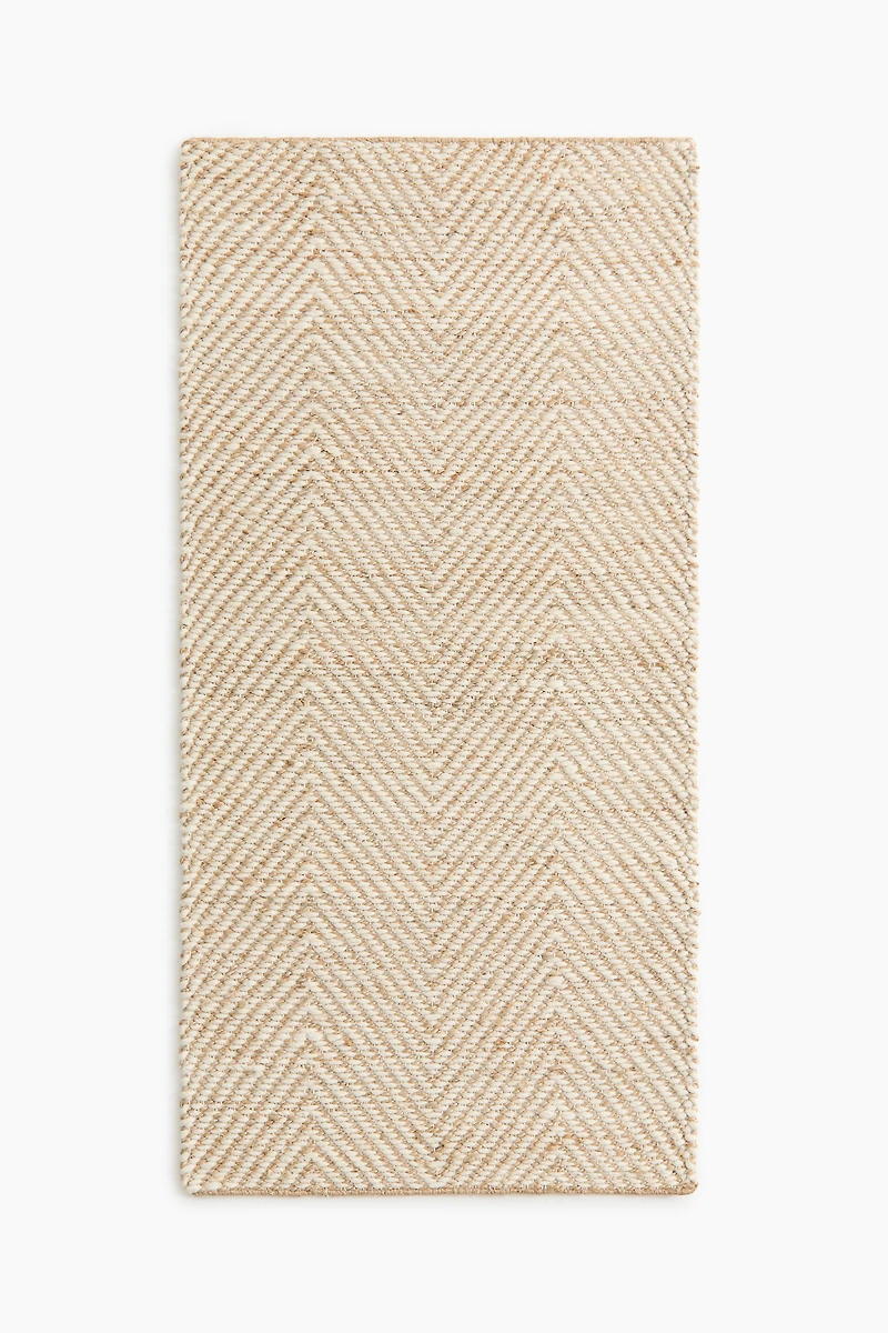 Tapis de couleur en laine mélangée à motif chevron