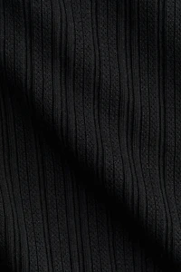 Haut côtelé avec col cheminée