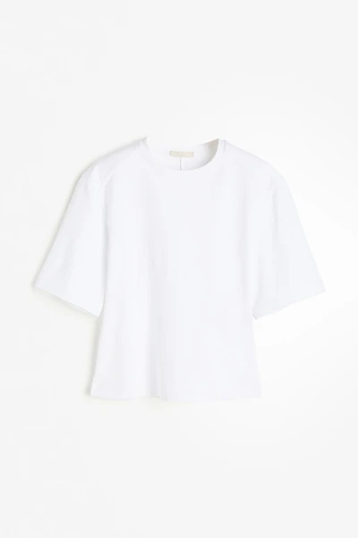 Haut avec taille cintrée