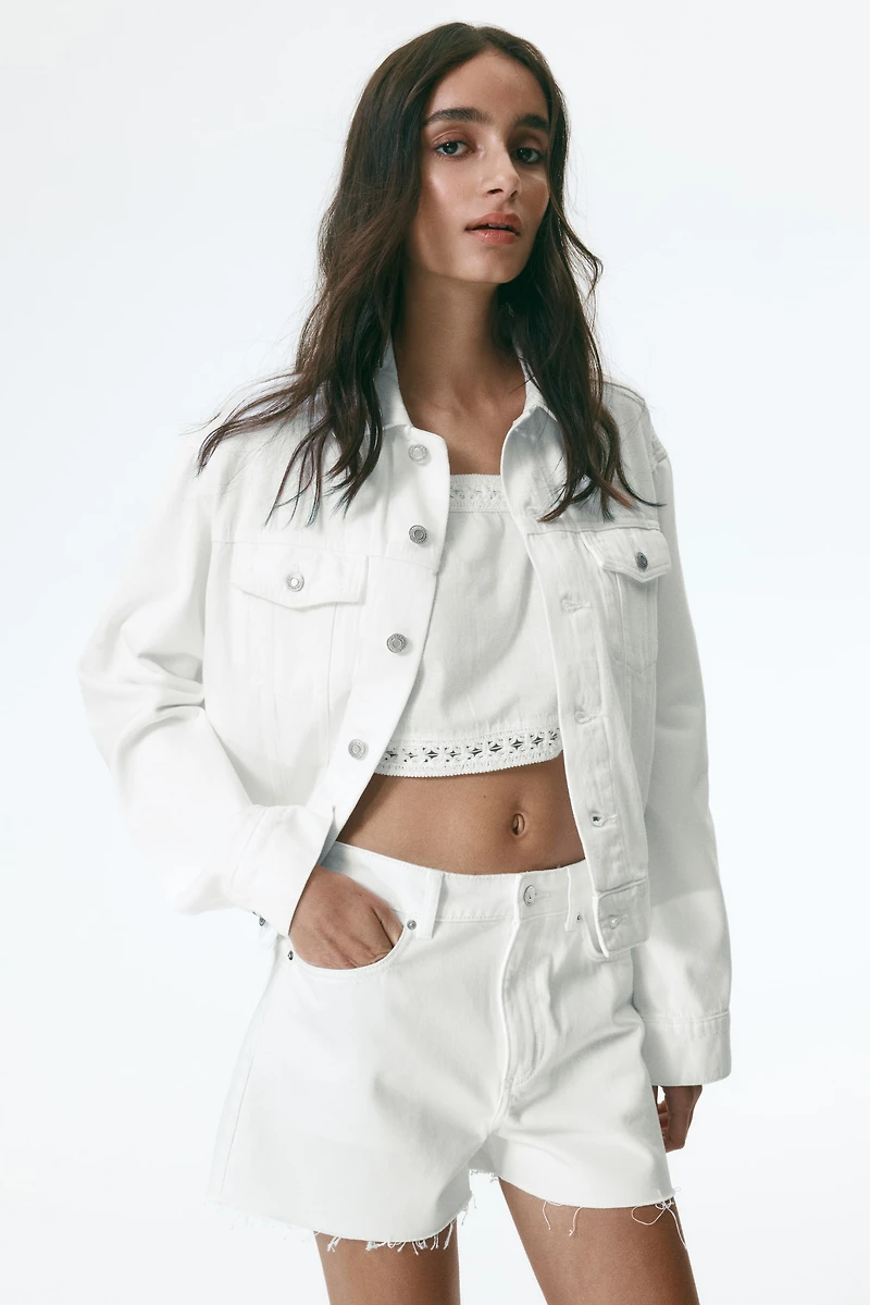 Raw-edge denim shorts