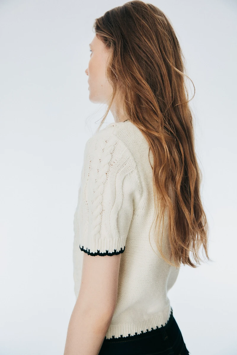 Gilet en tricot torsadé