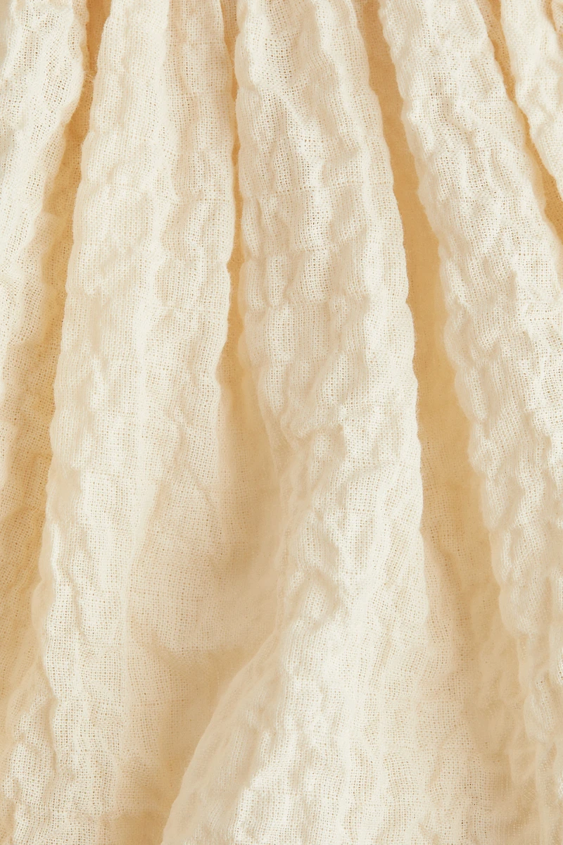 Robe cache-couche avec jupe en crépon