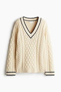 Pull à encolure en V maille torsadée