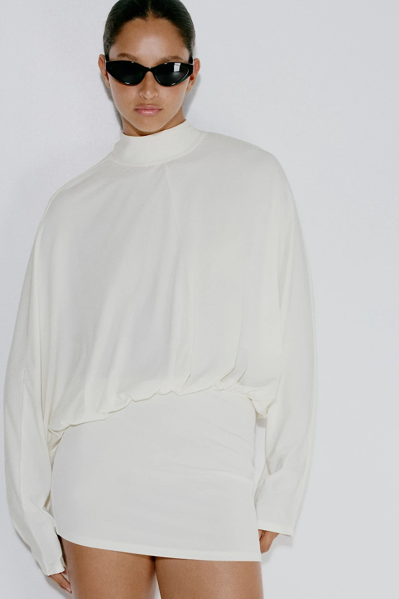 Robe à manches chauve-souris avec détail nouer