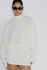 Robe à manches chauve-souris avec détail nouer