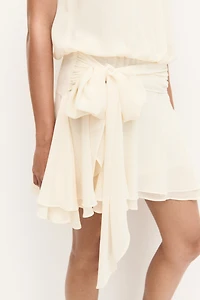 Robe en mousseline avec détail à nouer