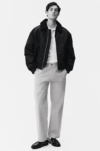 Polo près du corps en tricot jacquard