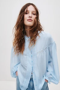 Blouse à volants avec manches ballon