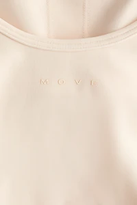 Haut de sport à soutien-gorge intégré SoftMove™